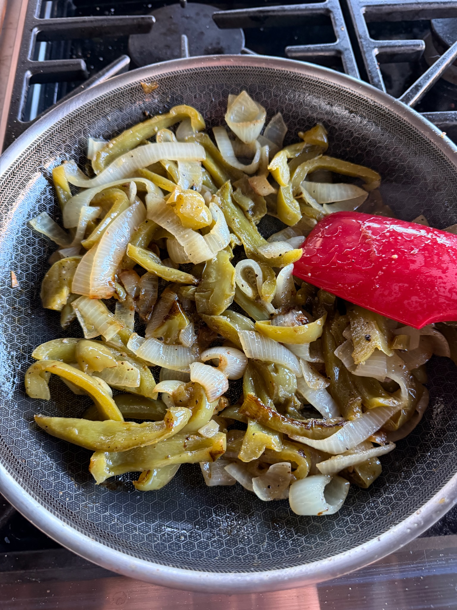 Sweet peppers and onions cooking in the test kitchen.