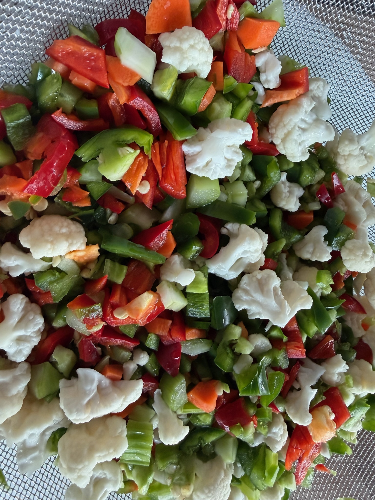 Chopped peppers, cauliflower, carrots and celery for the giardiniera.