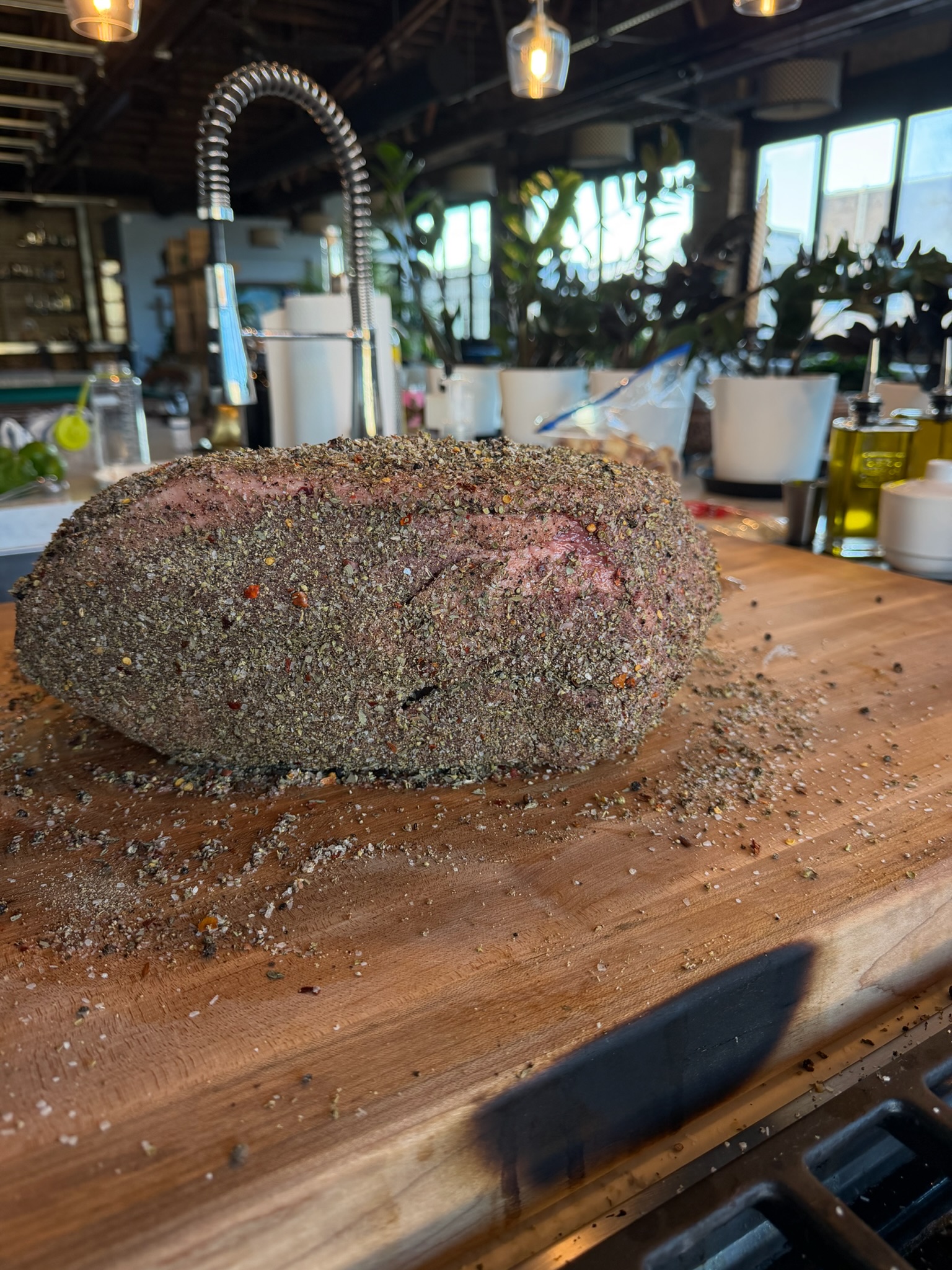The bottom round roast covered with its seasoning blend.