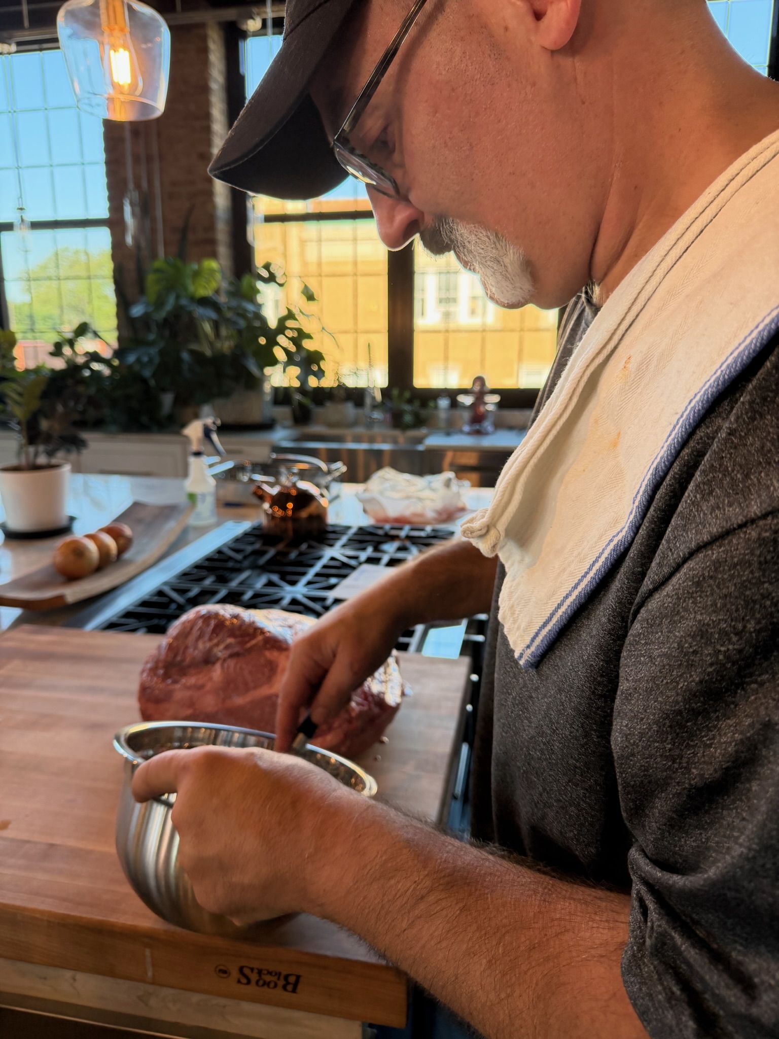 Doug measuring and applying the roast seasoning.